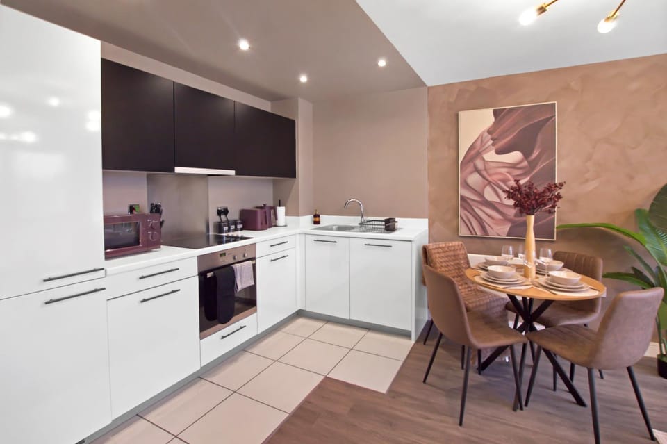 Kitchen or kitchenette, Living room, Seating area, Dining area, dishwasher, oven, stove, toaster
