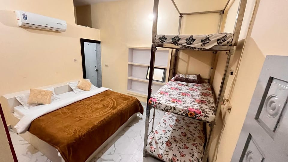 Bed, Photo of the whole room, Bedroom, bunk bed, towels, air conditioner