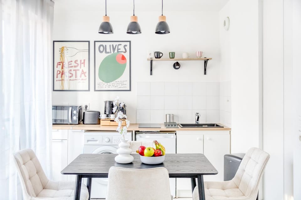Kitchen or kitchenette, Dining area, microwave, stove, toaster, washing machine