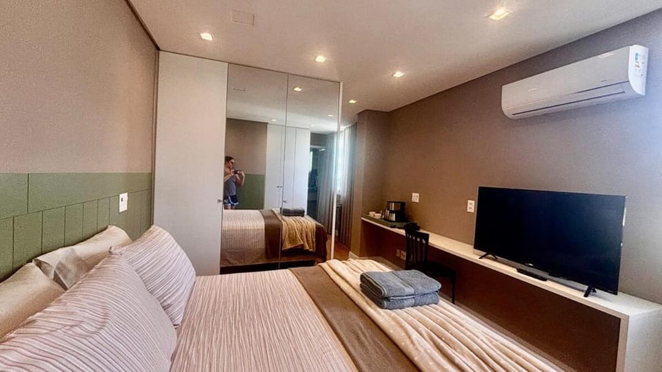 Studio com banheira e ar - ZSUL de BH! Apartment in Belo Horizonte