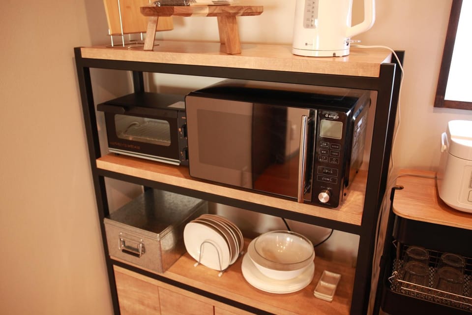 Kitchen or kitchenette, microwave, toaster