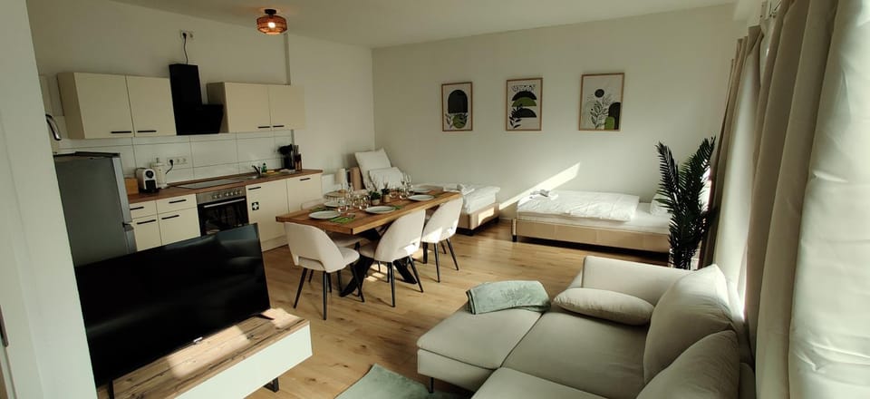 Kitchen or kitchenette, Living room, Seating area, Dining area