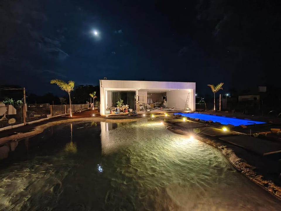 Property building, Night, Natural landscape, Pool view, Swimming pool
