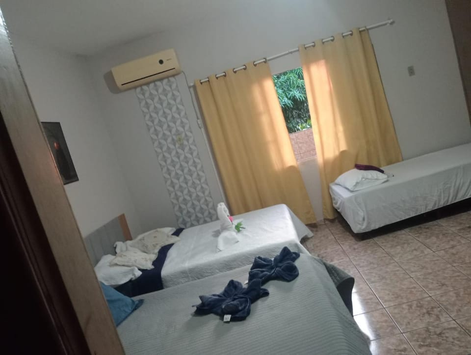 Bed, Photo of the whole room, Bedroom, towels, air conditioner