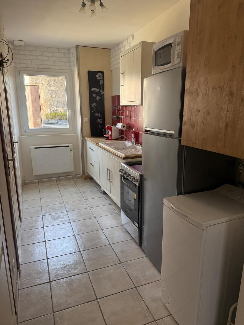 Coffee/tea facilities, microwave, stove, washing machine, kitchen