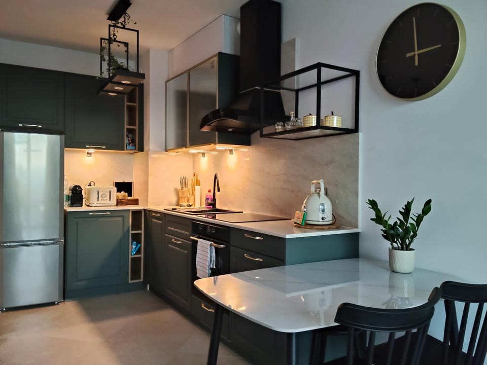 Kitchen or kitchenette, oven, stove, toaster