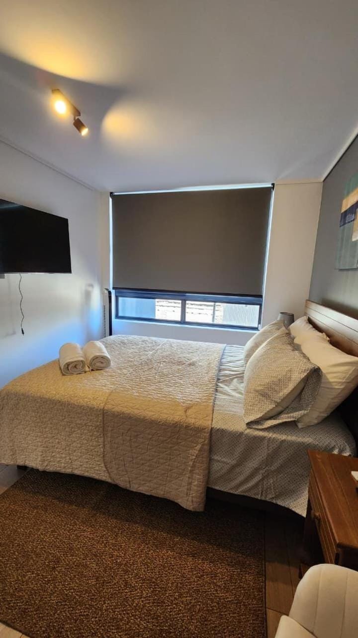 Departamento moderno en Ñuñoa, a pasos del metro Irarrazaval Apartment in Santiago