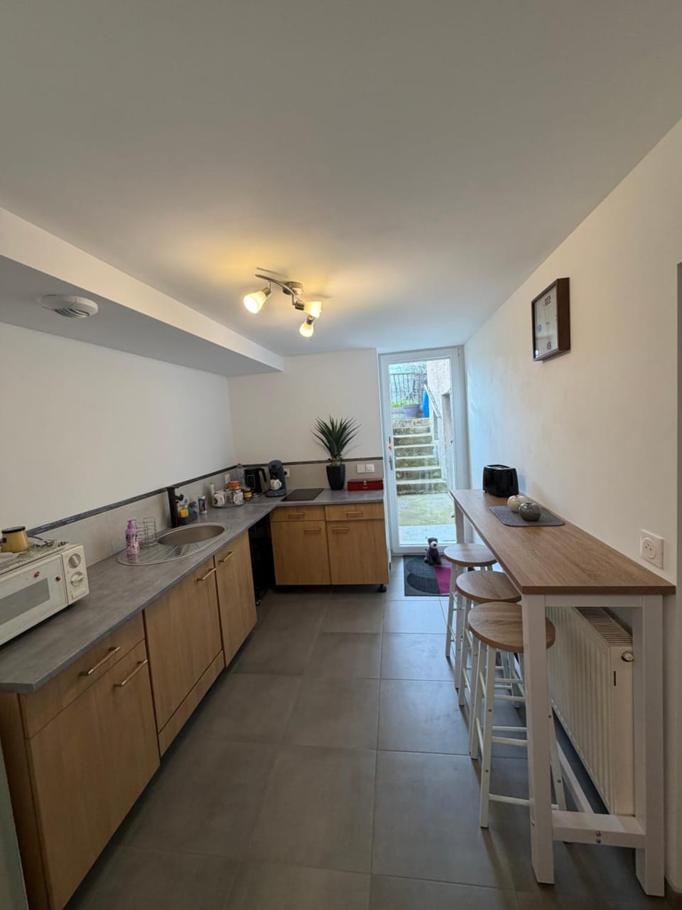 Kitchen or kitchenette, stove
