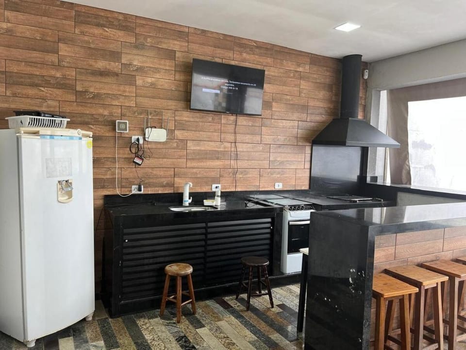 Casa de temporada com piscina e sinuca em Peruíbe House in Peruíbe