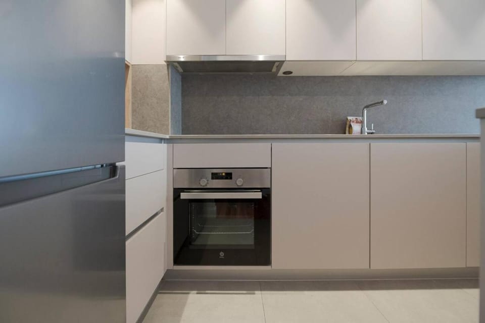 Kitchen or kitchenette, oven, stove