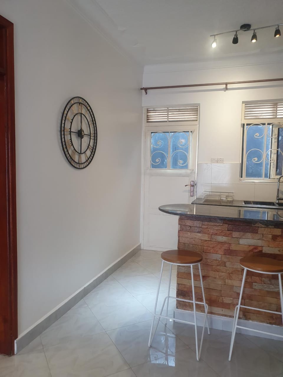 Two Bedrooms Apartment, located between kajjansi and kitende, with one bathroom, a living room, fully furnished kitchen, patio, free wifi, free parking space Apartment in Uganda