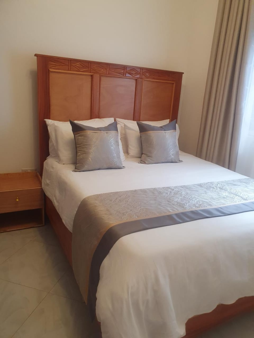 Two Bedrooms Apartment, located between kajjansi and kitende, with one bathroom, a living room, fully furnished kitchen, patio, free wifi, free parking space Apartment in Uganda