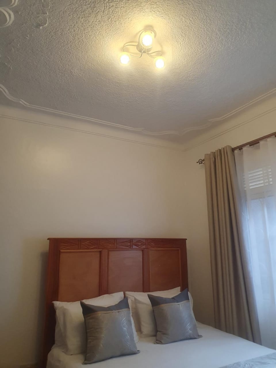 Two Bedrooms Apartment, located between kajjansi and kitende, with one bathroom, a living room, fully furnished kitchen, patio, free wifi, free parking space Apartment in Uganda