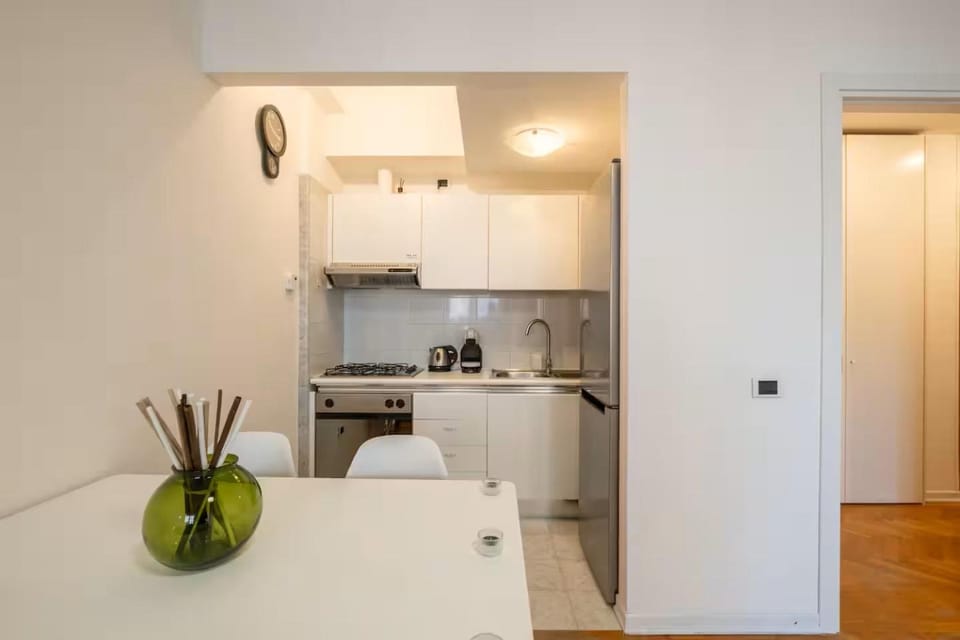 Kitchen or kitchenette, oven, stove, air conditioner