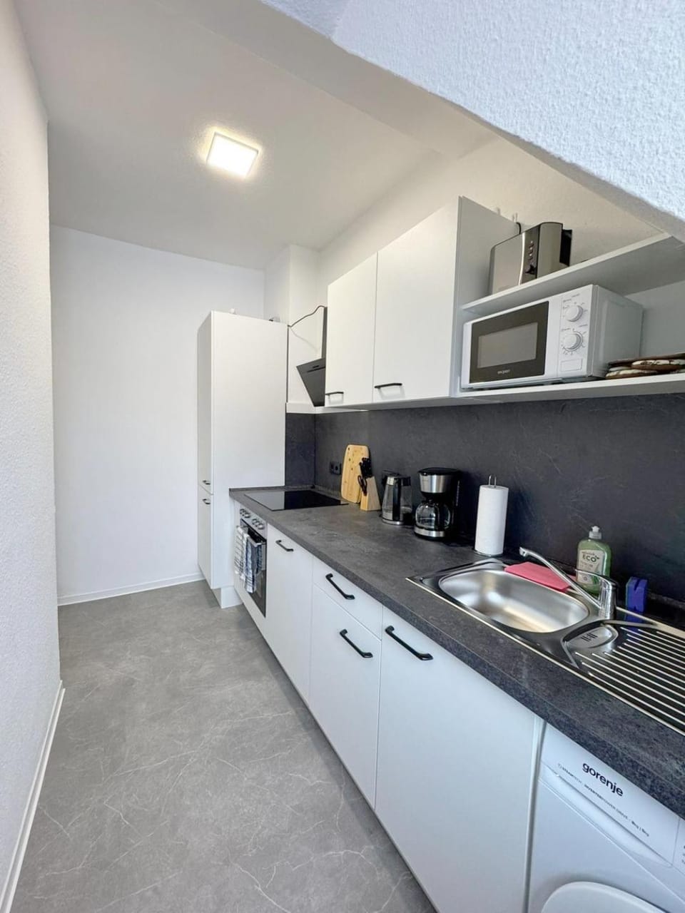 Kitchen or kitchenette, microwave, toaster, kitchen