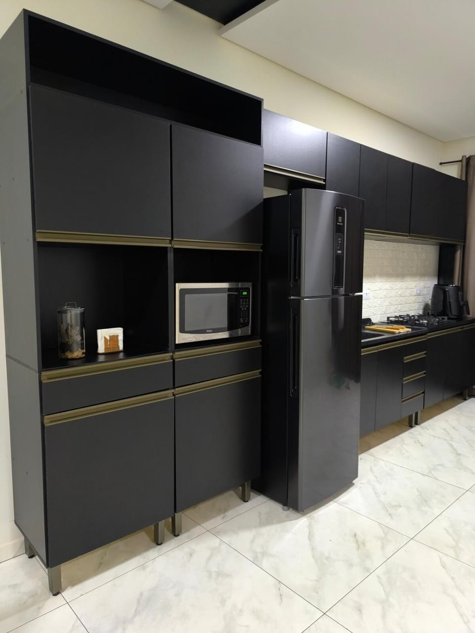 Kitchen or kitchenette, microwave, stove, kitchen
