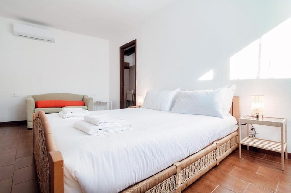 Design Apartment with Historic Beams Cotto Lombardo Apartment in Como