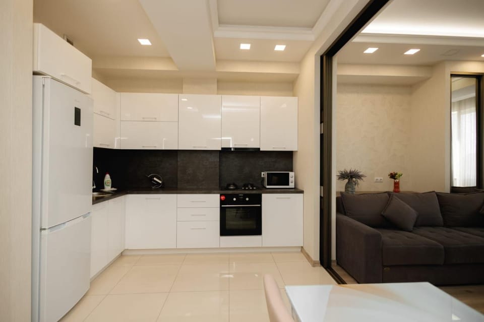 Kitchen or kitchenette, Living room, Seating area, stove