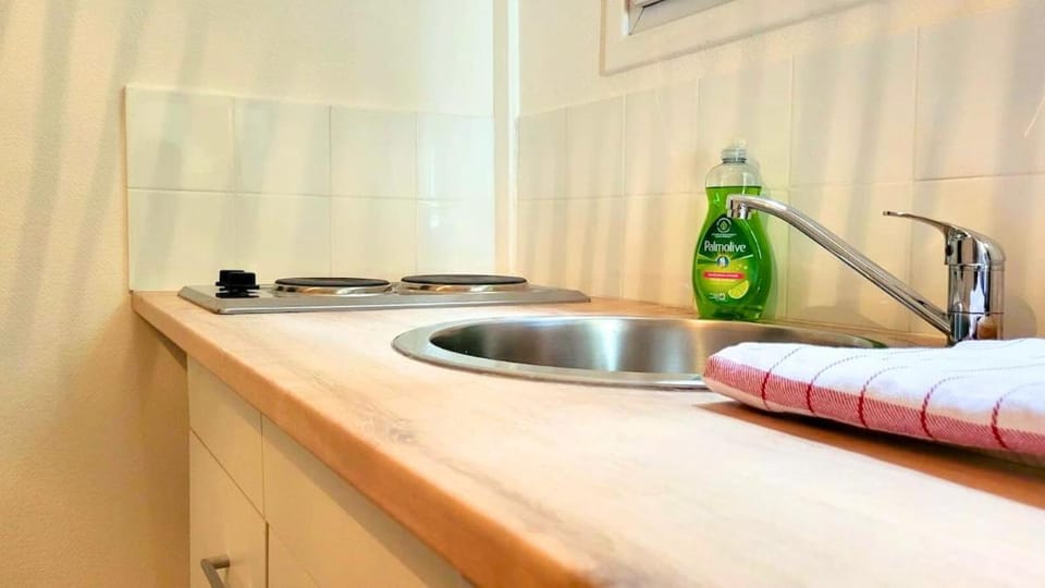 Kitchen or kitchenette, stove