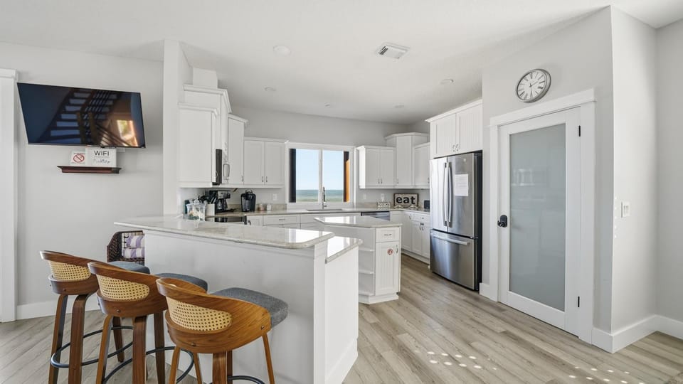 Kitchen or kitchenette, dishwasher, oven, stove, toaster