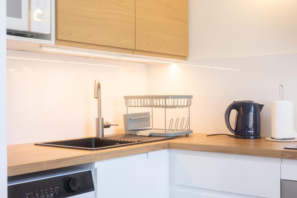 Kitchen or kitchenette, stove, toaster