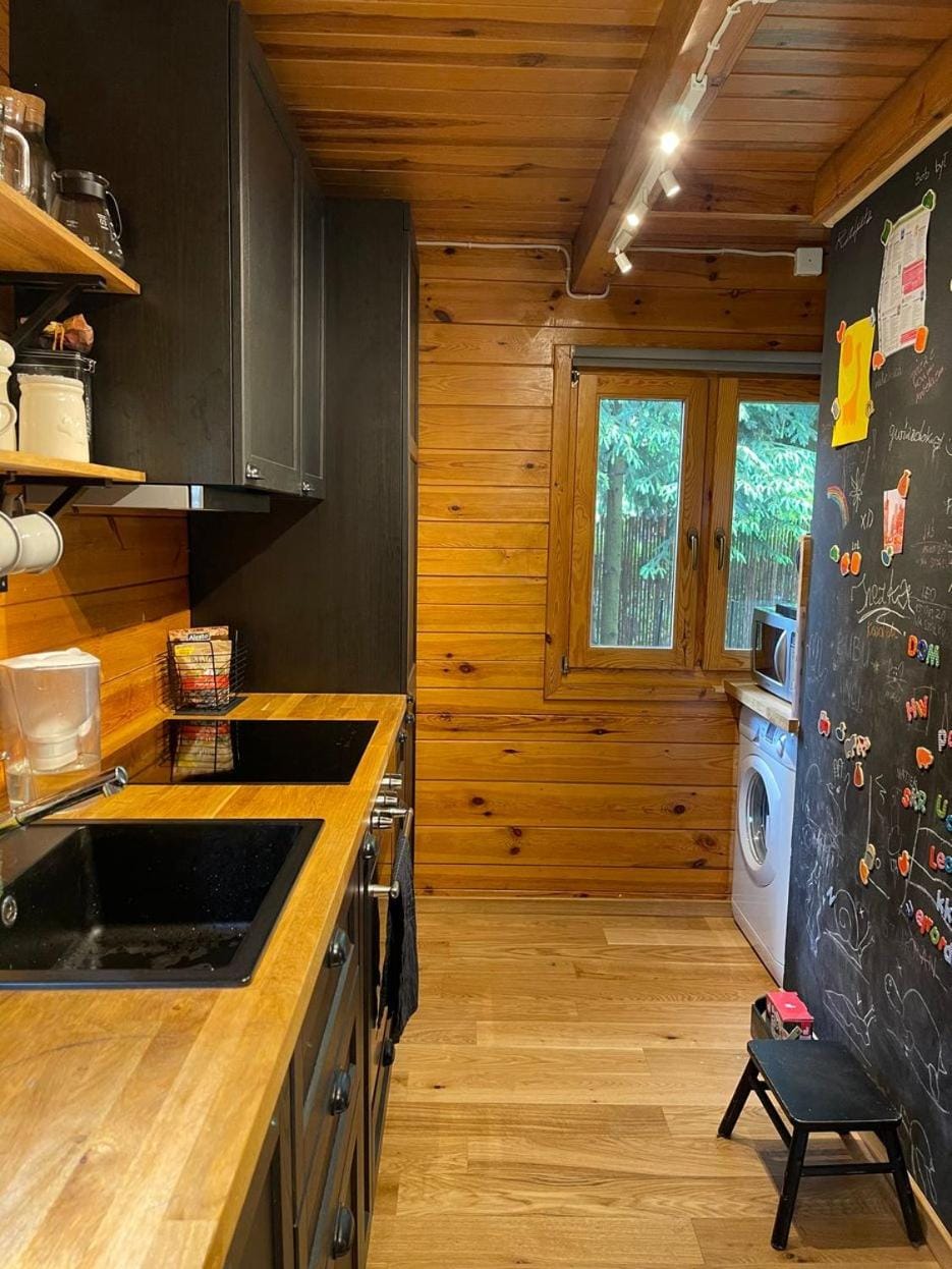Kitchen or kitchenette, stove, washing machine, kitchen