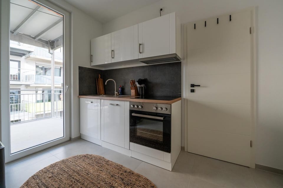 Kitchen or kitchenette, dishwasher, stove