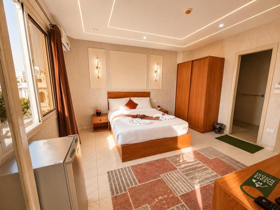 Bed, Living room, Photo of the whole room, Seating area, Bedroom, wardrobe