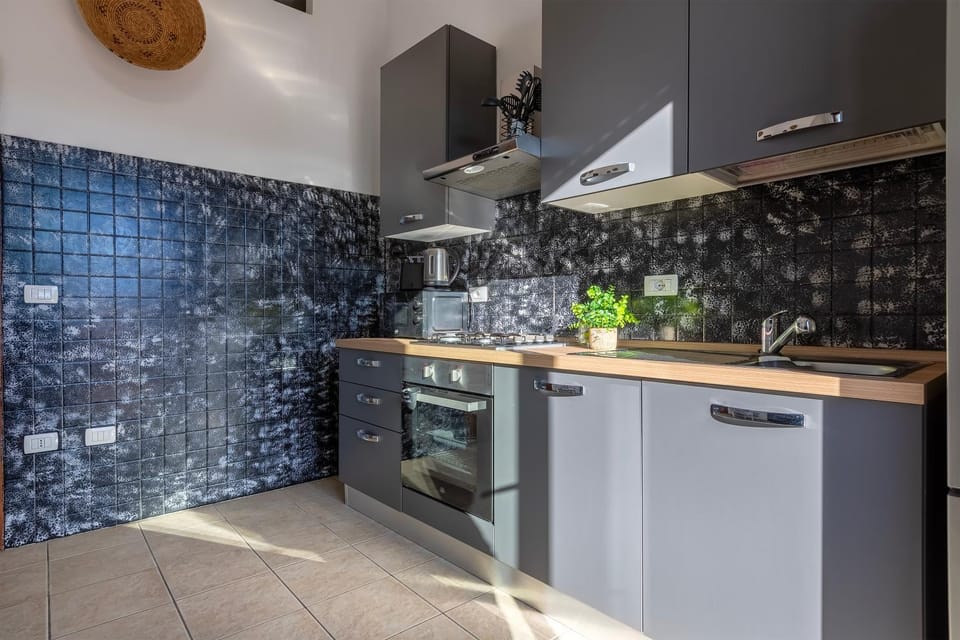 Kitchen or kitchenette, stove, kitchen