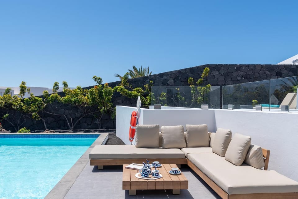 Property building, Living room, Swimming pool