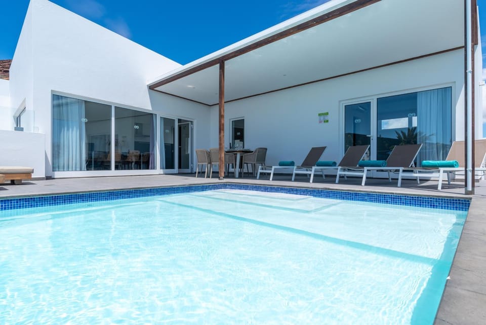 Property building, Living room, Swimming pool
