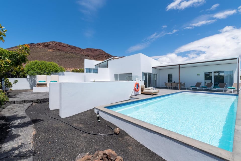 Property building, Living room, Swimming pool