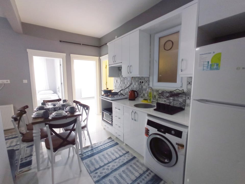 Kitchen or kitchenette, Living room, Dining area, stove, washing machine