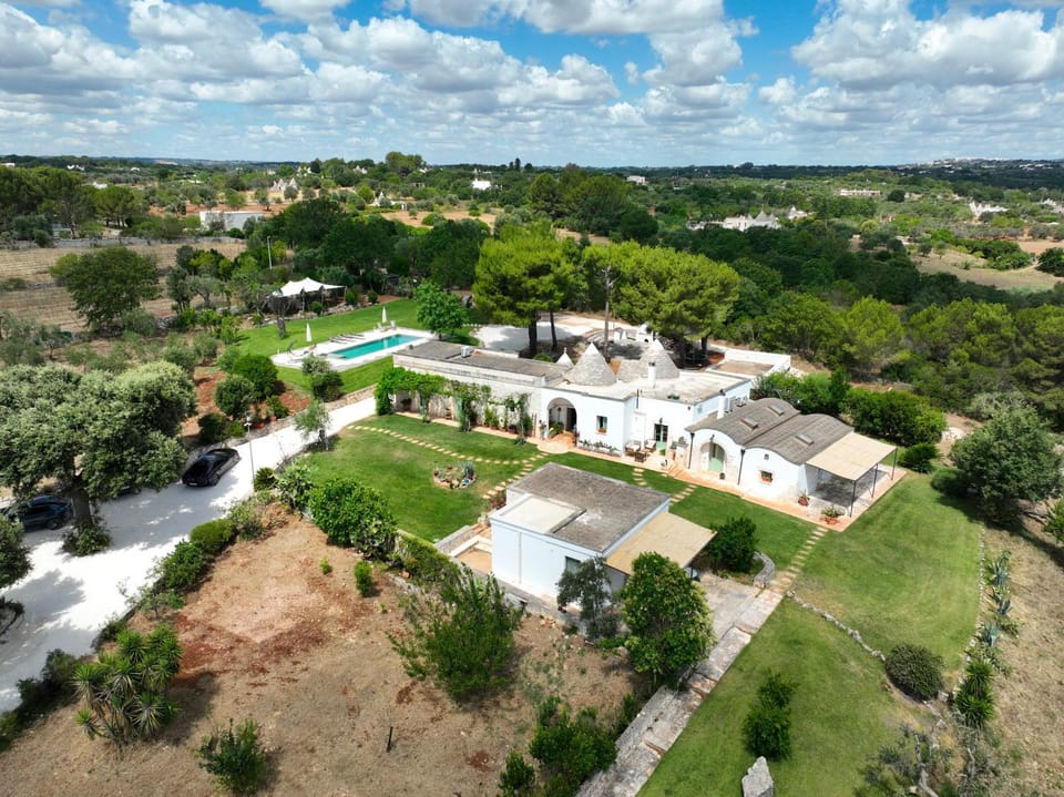 Property building, Nearby landmark, Spring, Day, Neighbourhood, Natural landscape, Bird's eye view, City view, Pool view, Street view, Swimming pool