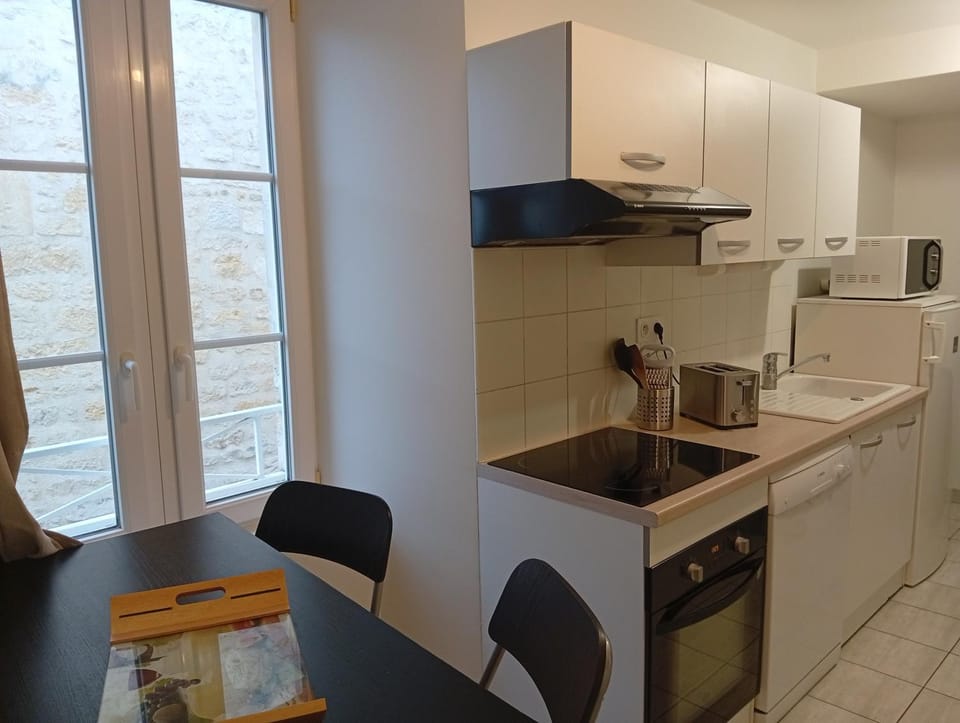 Dining area, dishwasher, oven, stove