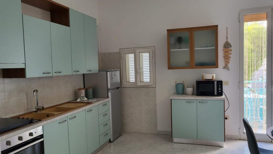 Kitchen or kitchenette, oven, stove