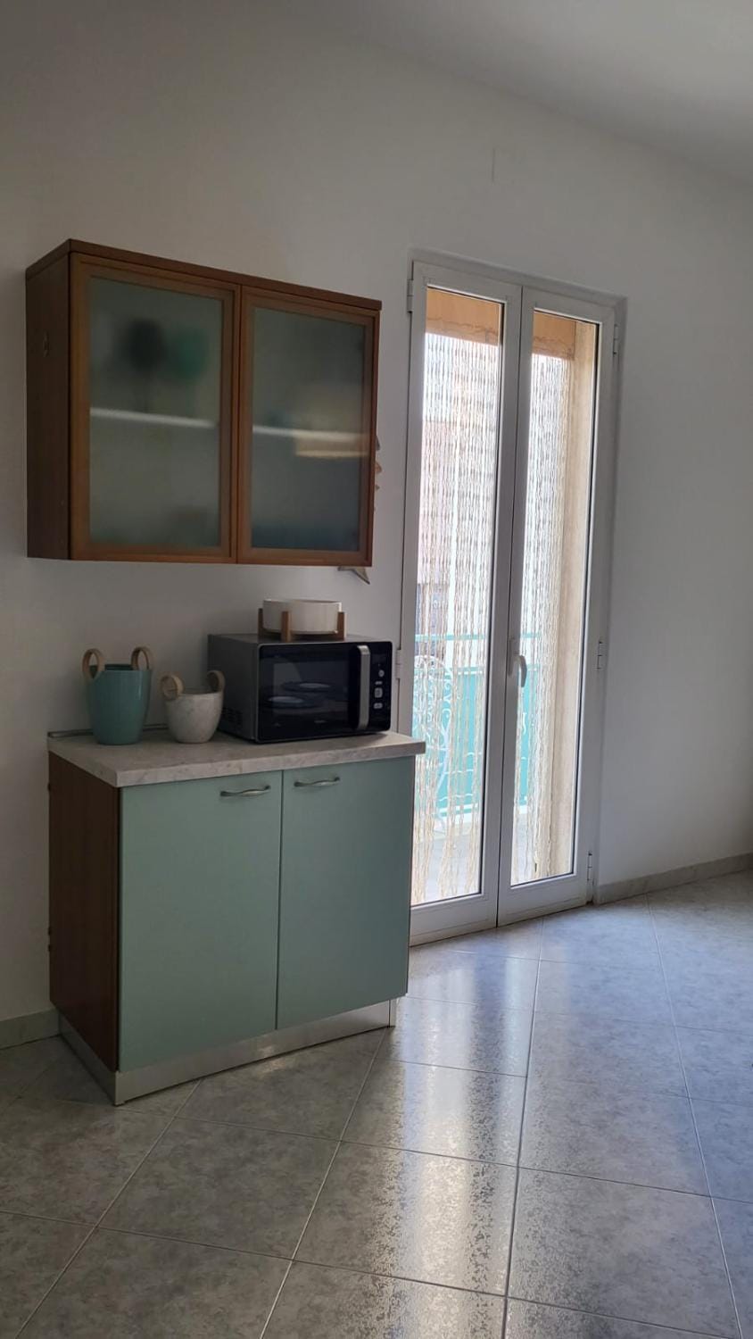 Kitchen or kitchenette, microwave