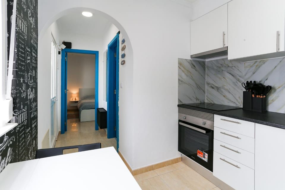 Kitchen or kitchenette, oven, stove
