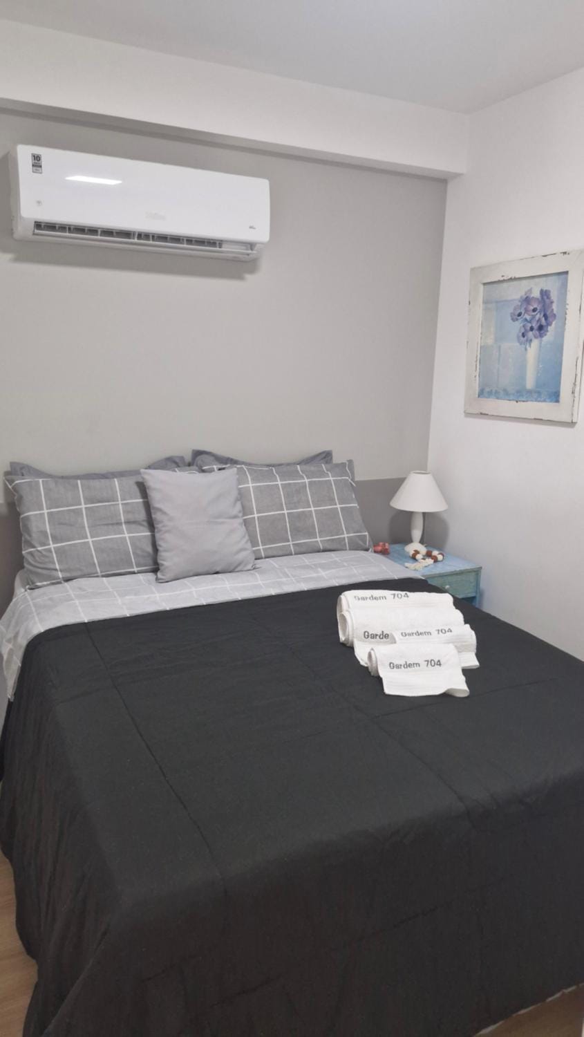 Bed, Photo of the whole room, Bedroom, towels, air conditioner