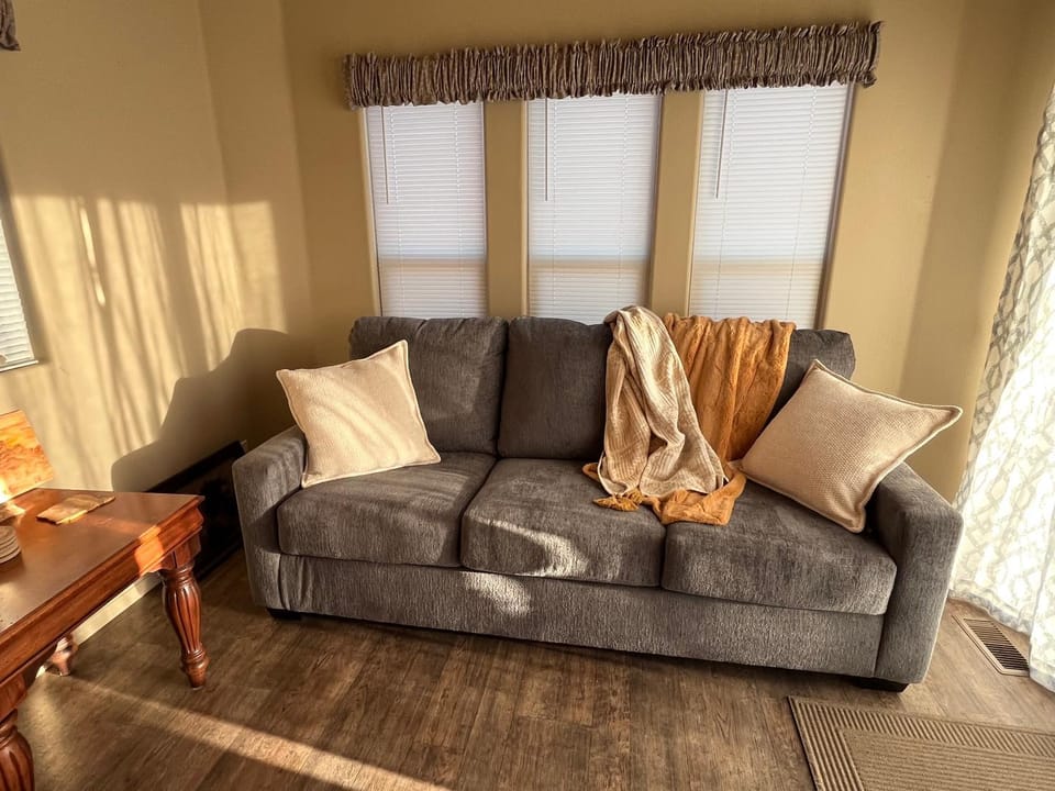 Property building, Bed, Living room, Seating area, Mountain view, Mountain view