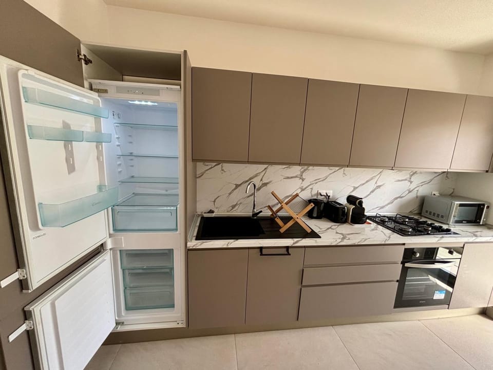 Kitchen or kitchenette, oven, stove