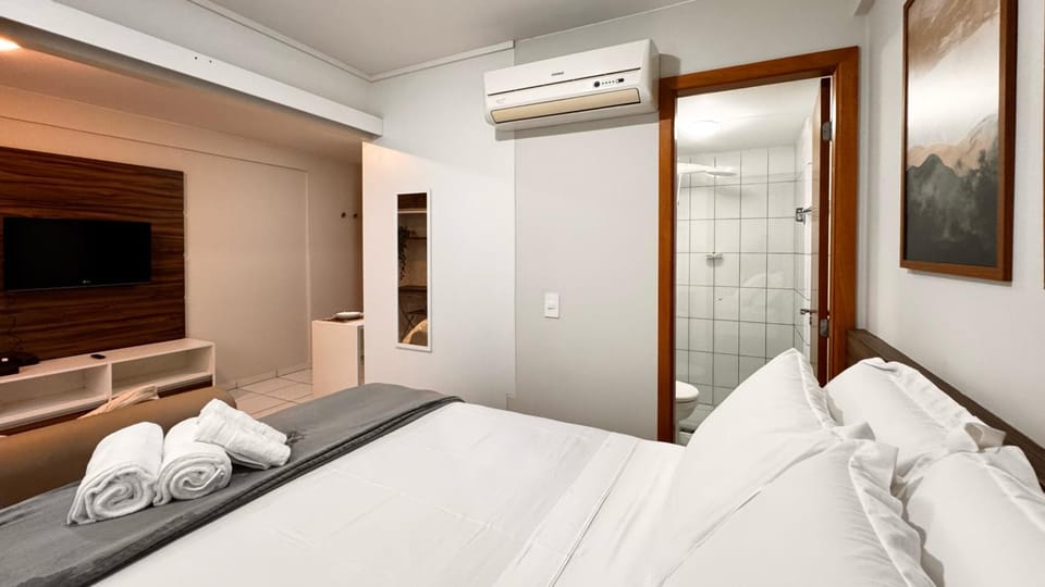 Shower, Bed, Bathroom, TV and multimedia, Photo of the whole room, Bedroom, towels, wardrobe, air conditioner
