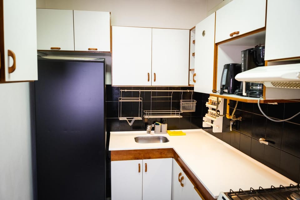 Kitchen or kitchenette, oven, stove