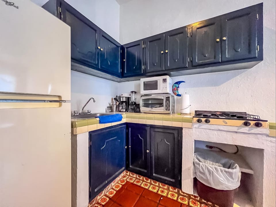Kitchen or kitchenette, oven, stove, toaster, kitchen