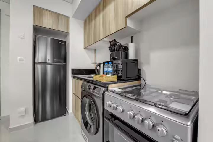 Modern 1BR - High Floor - Balcony - DAMAC Hills Apartment in Dubai