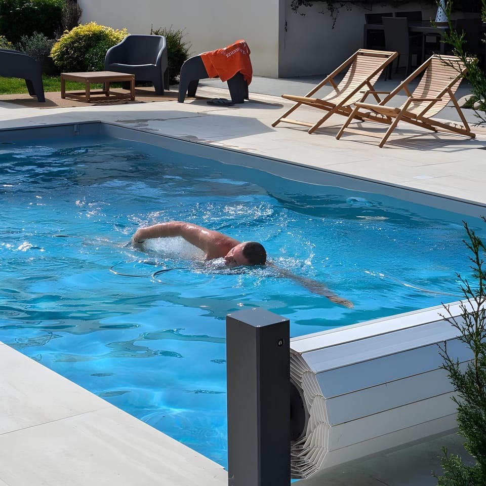 Property building, Living room, Swimming pool
