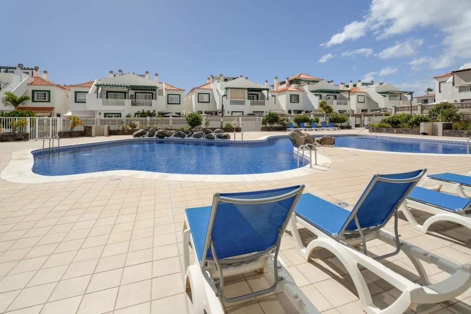 Property building, Living room, Swimming pool