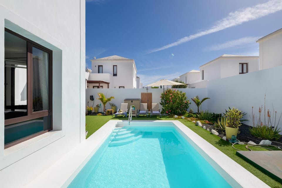 Property building, Living room, Swimming pool