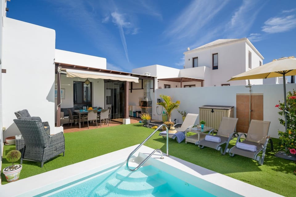 Property building, Living room, Swimming pool