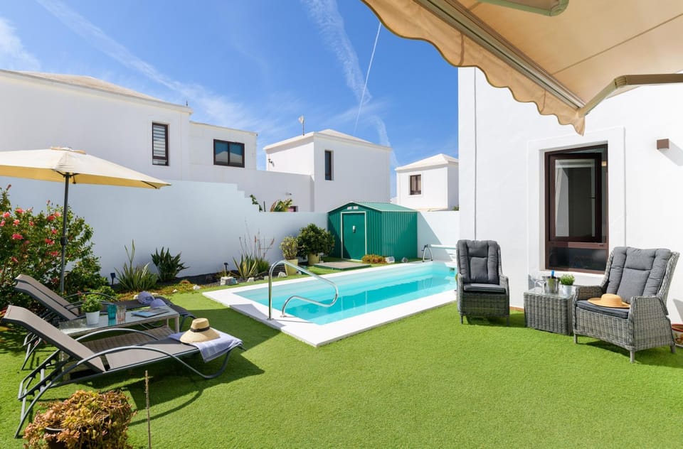 Property building, Living room, Swimming pool